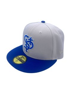 Represent your St. Paul Saints with this exclusive drop. Features gray top, royal blue bill with metallic stitching, this cap pops for the gram. This New Era Men's 59FIFTY fitted hat a must have for any local collector. The team hat Bill Murray wore in Space Jam, represent with this custom cap. Material: 100% Polyester Metallic stitching Gray underbrim High Crown Structured fit Flat bill Fitted Raised embroidery Six panel construction with embroidered eyelets Surface Washable Officially licensed Nfl Hats, Flex Fit Hats, Nba Hats, Custom Caps, Raised Embroidery, Nhl Jerseys, Bill Murray, Gray Top, Memphis Grizzlies