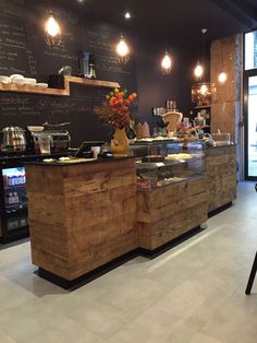 a restaurant counter with lots of food on it