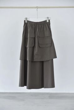 Olivia Mark - Femininely Stylish Double-Layer Patch Pocket Soft Midi Skirt Gray Workwear Skirt With Pockets, Brown Cargo Skirt With Pockets For Spring, Fall Gray Skirt With Pockets, Khaki Skirt With Pockets, Khaki Long Skirt With Pockets, Greyish Brown, Types Of Skirts, Olivia Mark, A Line Skirt