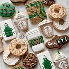 starbucks cookies are arranged in the shape of doughnuts and coffee mugs with different toppings