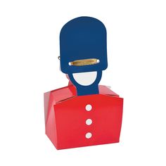 a red box with a blue face and gold nosepiece on it's head