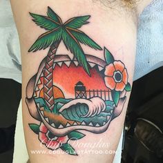 a colorful tattoo design with palm trees and flowers