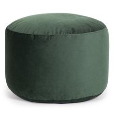 a large green bean bag sitting on top of a white floor