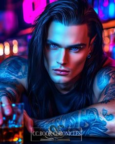 a man with long hair and tattoos leaning on a table in front of neon lights