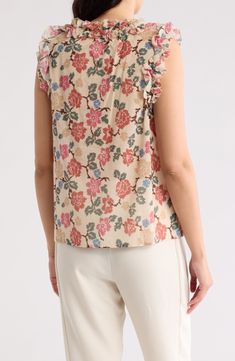 Romantic ruffles frame this floral top cut from cotton with a split neck that ties. 28" length (size Small) Split neck with ties Sleeveless 100% cotton Machine wash, tumble dry Imported Printed Cotton Blouse With Ruffle Sleeves, Cotton Top With Floral Print And Ruffle Sleeves, Cotton Ruffle Sleeve Tops With Floral Print, Cotton Tops With Ruffle Sleeves And Floral Print, Cotton Tops With Floral Print And Ruffle Sleeves, Cotton Floral Print Top With Ruffled Collar, Cotton Tops With Floral Print And Ruffled Collar, Cotton Blouse With Floral Print And Ruffle Sleeves, Patterned Cotton Tops With Ruffles