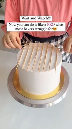 a person is cutting into a cake with toothpicks on it that reads wait and watch now you can do it like a pro what most bakers struggle for