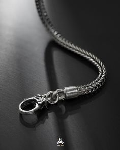 Material: Silver S925 Brand: HELIOS GLOBAL Specific: 3 sizes with length 50cm, 55cm, 60cm The same brother to the Eden x Wave Silver Necklace, this Eden x Lotus does not use a silver wave-shaped buckle, but it owns the signature symbol of Helios - Lotus. + Helios Global - a handcrafted jewelry brand manufactured and designed by the most skilled jewelers.+ All of our jewelry products come with a lifetime warranty. Note: Custom Printed Packaging Box - Style and Personality - Only at Helios Global Classic Engraved Snake Chain Jewelry, Silver Wheat Chain Bracelet Gift, Silver Snake Chain Jewelry With Oxidized Finish, Silver Oxidized Snake Chain Jewelry, Sterling Silver Snake Chain Jewelry With Polished Finish, Sterling Silver Jewelry With Polished Snake Chain, Silver Oxidized Finish Snake Chain Jewelry, Silver Jewelry With Oval Link Wheat Chain, Sterling Silver Wheat Chain Bracelet For Gift