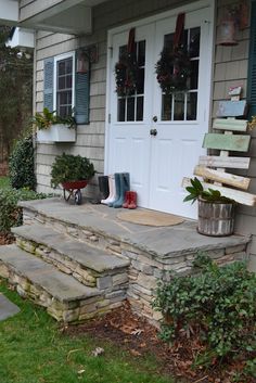 a front porch with steps leading up to the door