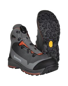 a pair of gray and orange hiking boots on a white background with the words sims written