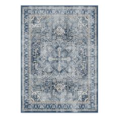 an area rug with blue and beige colors