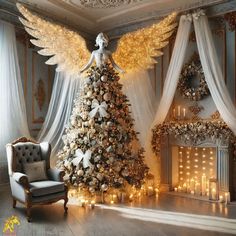 a christmas tree decorated with angel wings in a room next to a chair and fireplace