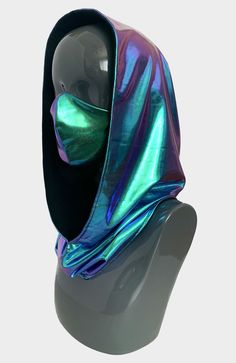 Unleash your Spiritual Ninja in our Aura Festival Hood and Mask! We've designed our reversible hoods with a gorgeous blue and purple shifting holographic fabric, and on the reverse side we use a solid black fabric made from sustainably harvested eucalyptus trees. Our hoods are reversible and can easily slip over your head. They are unisex one size fits all! Our adjustable Aura masks are also lined with our eucalyptus fabric making them soft to the touch. * Handmade in California * Made from Scra Purple Ninja Outfit, Galaxy Theme Outfit, Rave Hood, Spider Oc, Holographic Rave Outfit, Futuristic Outfits, Ninja Outfit, Rave Outfits Edc, Holographic Fabric