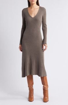 Vertical ribbing calls out your contours when you wear this staple sweater dress knit from a soft cotton-enriched blend. Slips on over head V-neck Long sleeves 40% cotton, 40% recycled polyester, 20% polyester Hand wash, dry flat Imported Spring Brown Ribbed Sweater Dress, Brown Ribbed Sweater Dress For Spring, Brown Ribbed Stretch Sweater Dress, Brown Stretch Ribbed Sweater Dress, Stretch Ribbed Brown Sweater Dress, Dress Knit, Long Sleeve Sweater Dress, Fabric Gift Bags, Nordstrom Store