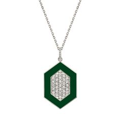 A colorful and sparkling statement for a special occassion. The CHROMA Pavé Hexagon Pendant make a big statement in a colorful and fun pendant. With 0.76cts of shimmering pavé set diamonds, this necklace can be layered with other MM pendants or worn on it's own for maximum statement! SKU #P491 20mm x 40mm pendant 7pcs 1.0mm, 29pcs 1.8mm G/H SI1 round pavé set diamonds 0.76ctw 1.3mm forzatina chain 16-18" adjustable available in black, white, green, blue and magenta 14k yellow or white gold Fun Pendant, Blue And Magenta, Hexagon Pendant, Jewelry Bags, White Green, Gold Black, Silver Necklace, Diamonds, White Gold