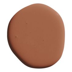 a round brown substance on a white background