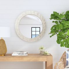 Bring coastal elegance to your home with our natural capiz shell mirror, a stunning accent piece that adds a touch of beachy sophistication to any room. The impressive circular frame is adorned with a mosaic of capiz shells, each piece showcasing a luminous, translucent quality that captures and reflects light beautifully. Handcrafted from shells sustainably sourced from the coast of Indonesia, this mirror combines organic charm with a hint of glamour. With D-rings for easy wall mounting, this … Capiz Mirror, Capiz Shell Mirror, Room Dresser, Shell Mirror, Circular Frame, Coastal Elegance, Capiz Shell, Round Wall Mirror, Mosaic Designs