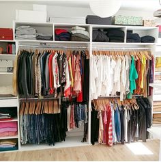 the closet is full of clothes and other things to wear on it's shelves