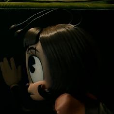 an animated girl with long hair and big eyes is looking at something in the distance