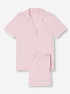 Perfect for lounging in when you get home from work, a good night's sleep and then breakfast round the table in the morning - our ballet pink Lara jersey shortie pyjamas work effortlessly as a versatile modern take on the classic pyjama. Designed for a flattering but comfortable shape, our women's shortie pyjamas will keep you looking great and feeling comfortable throughout the seasons. The short sleeve jacket top features a fully piped finish in a contrasting white piping for a stylish appeara Light Pink Pajamas, Feminine Pink Cotton Pajama Shorts, Pink Short Loungewear Sleepwear, Pink Short Sleepwear With Relaxed Fit, Pink Relaxed Fit Short Sleepwear, Pink Relaxed Fit Pajama Shorts For Loungewear, Feminine Pink Short Sleepwear, Pink Pyjamas, Pink Pajama Set