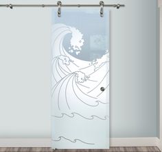 a white door with an artistic wave painted on it's glass and silver hardware