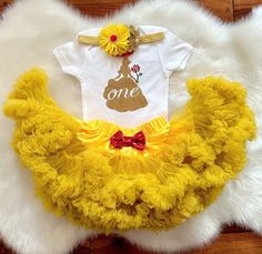 This listing is for Baby girl's Belle theme First Birthday outfit .  Includes  1.Bodysuit 2.Premium fluffy Pettiskirt 3. Headband  Shoes sold separately  https://www.etsy.com/listing/840596116/baby-girl-shoes-golden-baby-shoes-belle?ga_search_query=Shoes&ref=shop_items_search_1&crt=1 Name can be added on the bodysuit. Please leave a note in the note to seller box upon checkout for personalization. Bodysuit used is carter's brand . Carter's Bodysuit is Crafted in babysoft cotton,  Easy to change Beauty And The Beast One Year Old Party, Beauty And The Beast 1st Birthday Party, Beauty And The Beast 1st Birthday, Beauty And The Beast First Birthday, Princess Belle Party, Belle Birthday Party, Beauty And Beast Birthday, Bumble Bee Costume, Belle Outfit