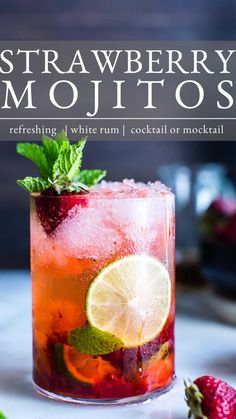 a strawberry mojito with lime and mint garnish