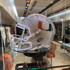 a football helmet on display in a store