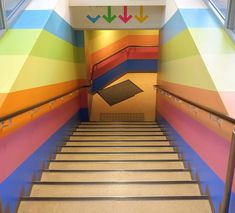 the stairs are painted with different colors and designs