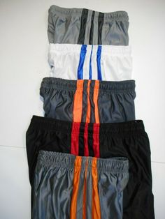 Boys Shorts, Sports, Baseball, Basketball, Soccer, Outfits Boys Cool Shorts come in 3 colors, long legged shorts, 2 pockets, elastic waistband with tie string, Slick Material 100% Polyester. Size Available   Medium 10-12 Color Choice  Medium Gray/Orange, Dark Gray/Orange, White/Blue, Medium Gray/Dark Gray Brand New with Tags By Brooklyn Unlimited BUY 3 Pairs Get the 4th Pair FREE !!  (Mix n' match any on my site) Measurements are approx. Any color variation is due to lighting. We ship daily. All Casual Sports Shorts With Three Stripes, Casual Shorts With Three Stripes For Sports Events, Casual Sports Bottoms With Three Stripes, Casual Jogging Shorts With Three Stripes, Casual Three Stripes Bottoms For Sports Events, Casual Stretch Athletic Shorts With Three Stripes, Casual Training Shorts With Three Stripes, Cool Shorts, Soccer Outfits