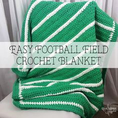 a green and white crocheted blanket with the words easy football field crochet blanket