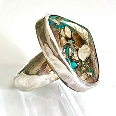 Signed, Vintage Southwestern Sterling Silver Boulder Turquoise Ring Total Weight ~ 12.7 Grams Verified Boulder Ribbon Turquoise Flush Setting Markings : “Sterling” Picto Hallmark (Currently Unidentified) Ring Size 6 Us Band Width ~ 5 - 10mm Boulder Ribbon Turquoise ~ 2.5 X 2 X 0.5cm Made In The Usa Handmade Aboriginal Native American Indigenous Collectible Investment Wearable Art Legacy Jewelry Statement Ring #9355 Flush Setting, Jewelry Statement, Vintage Navajo, Womens Jewelry Rings, Vintage Signs, Rings Statement, Statement Ring, Wearable Art, Vintage Sterling Silver