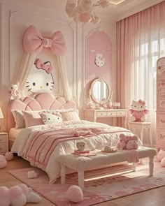 a bedroom decorated in pink and white with hello kitty decorations