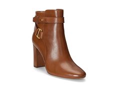 LAUREN Ralph Lauren Madelyn Bootie - Women's Boots : Deep Saddle Tan : Equestrian-inspired hardware brings refined style to the sleek Madelyn bootie, which is crafted from smooth burnished leather and features a padded footbed for all-day wear. Almond-shaped toe. Side zip closure. LRL engraved stirrup buckle. Ankle strap loops through the buckle and secures with a stud and keeper. Padded insole. Leather upper. Cotton, polyurethane, and leather lining. Rubber outsole. Imported. Measurements: Heel Dress Booties, Ralph Lauren Womens, Designer Boots, Shoes Booties, Leather Ankle Boots, Lauren Ralph Lauren, Women's Boots, Bootie, Saddle