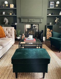 a living room with two couches and a coffee table in it's center