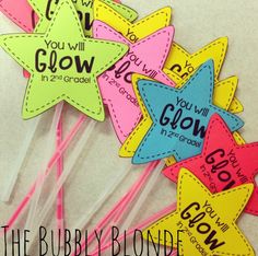 these star shaped lollipops are colorful and have the words you will grow in them