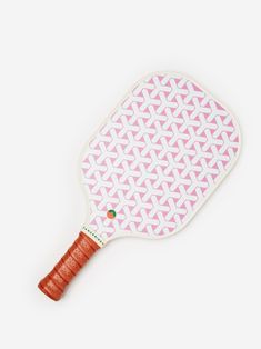 a pink and white tennis racket on a white background