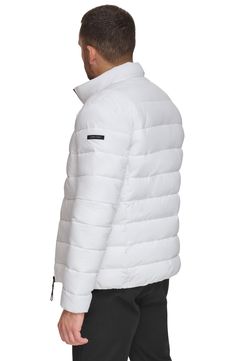 A tall stand collar structures this weather-ready puffer jacket crafted from stretch quilted fabric. Stand collar Long sleeves 100% Sorona polyester
 Machine wash, tumble dry Imported Model stats: 6'1" height, 32" waist. Model is wearing size Medium. White Puffer Jacket With Zipper For Outdoor, White Weatherproof Outerwear For Spring, White Nylon Puffer Jacket For Fall, White Outdoor Puffer Jacket With Zipper Closure, White Down Puffer Jacket For Spring, White Quilted Puffer Jacket For Cold Weather, White Quilted Outerwear For Outdoor, White Quilted Down Outerwear, White Quilted Outdoor Outerwear