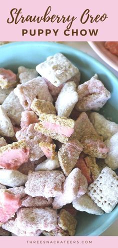 a blue bowl filled with pink and white puppy chow