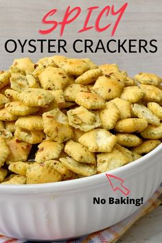 a white bowl filled with crackers sitting on top of a table