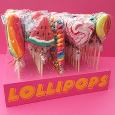 lollipops are wrapped in cellophane and placed on top of each other