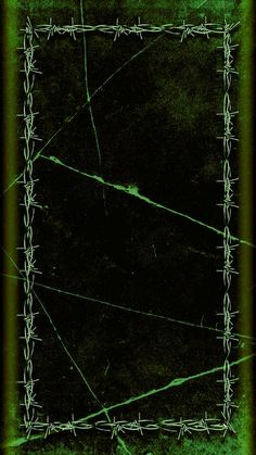 a green frame with barbed wire on the edges and bottom, in front of a black background