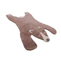 a brown bear rug on top of a white floor