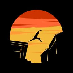 a person jumping into the air on top of a building with sunset in the background