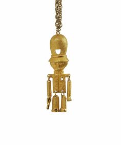 "What a whimsical pendant by Hillcraft! Circa 1960s, this necklace features a Nutcracker-themed, British \"Bobby\" police officer pendant in gold tone metal. The mustached police officer is articulated for movement and exquisitely detailed. The matching gold tone chain has a spring closure, and the back of the pendant is signed \"Hillcraft.\" In excellent vintage condition. MAKER: Hillcraft MATERIAL: gold tone metal PENDANT: 3.70\" long x 1.05\" wide CHAIN: 18.25\" long WEIGHT: 1.40 oz / 39 gram Mid-century Gold Necklace Gift, Libra Charm, Vintage Nutcracker, Stowe Vt, Vintage Nutcrackers, Figural Jewelry, Phoenix Bird, Book Pieces, Small Rose