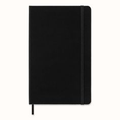 a black notebook is open on a white background