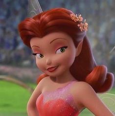 an animated image of a fairy with red hair and green eyes, wearing a pink dress