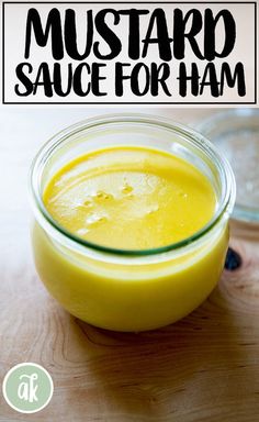 mustard sauce for ham in a glass bowl on top of a wooden table with text overlay