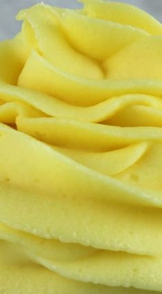 a close up view of some yellow frosting