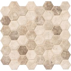 a white and brown tile pattern with hexagonal tiles on the bottom, in different shades