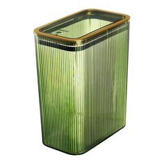 a green trash can sitting on top of a white floor